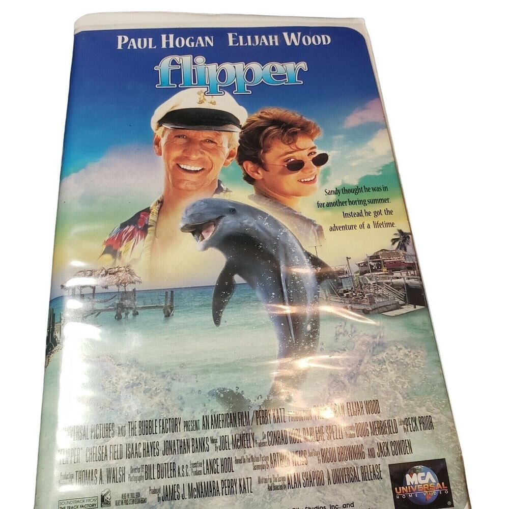 Flipper (VHS, 1996, Clamshell Case) Paul Hogan, Elijah Wood